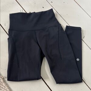 Women’s 5 8 inch black pants Wonder under with pockets  brand new never worn